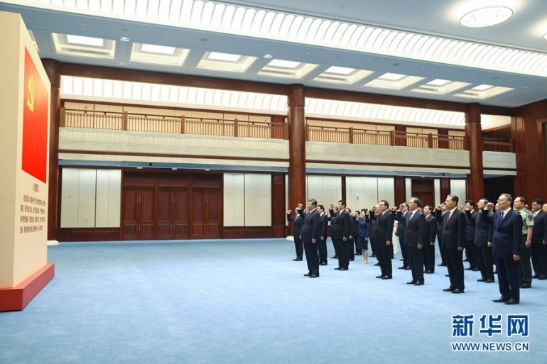 The photo shows officials of the Political Bureau of the Communist Party of China visiting the Chinese Communist Party History Exhibition Hall.